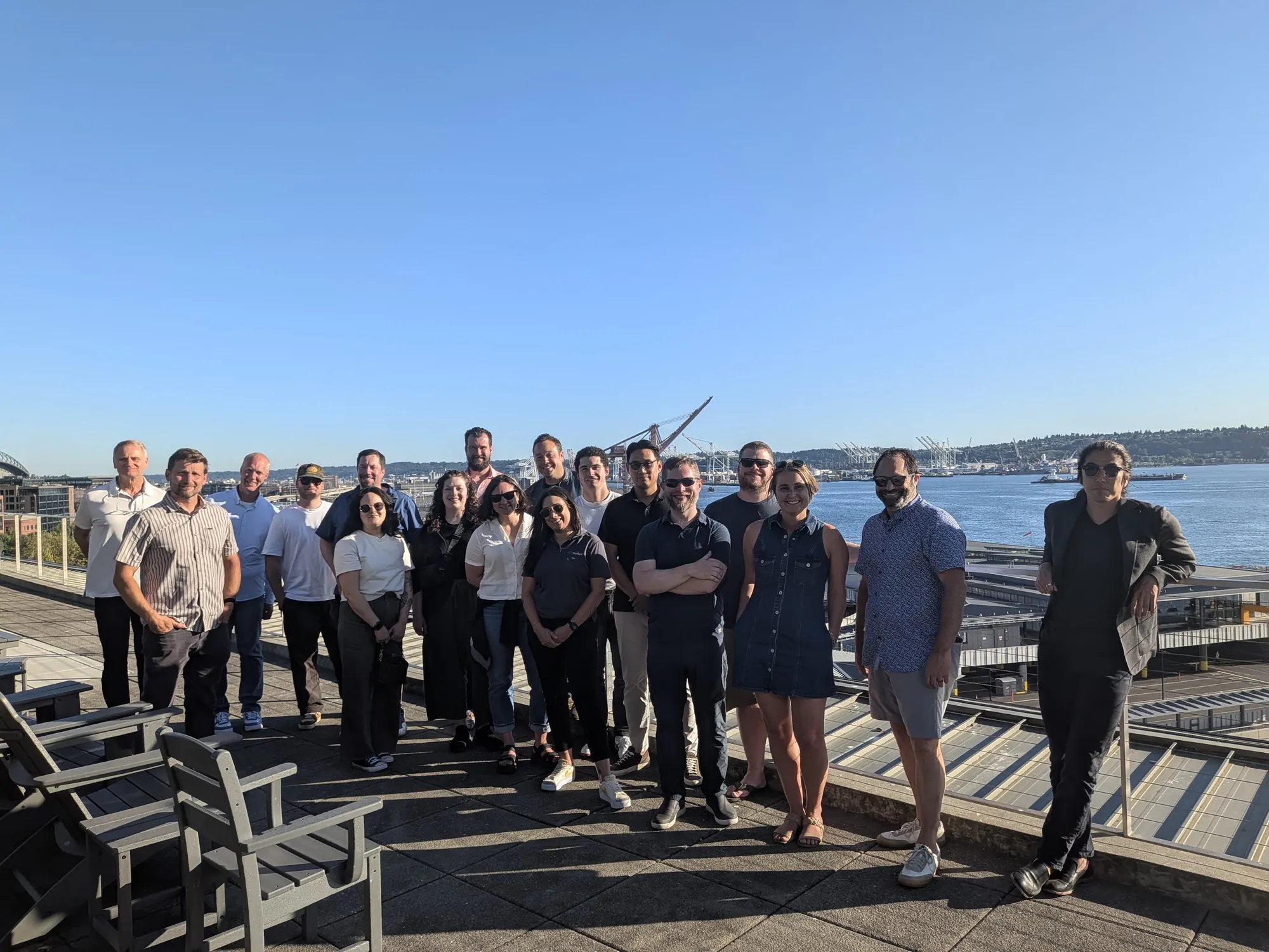 Attendees gathered on the rooftop deck overlooking Elliott Bay